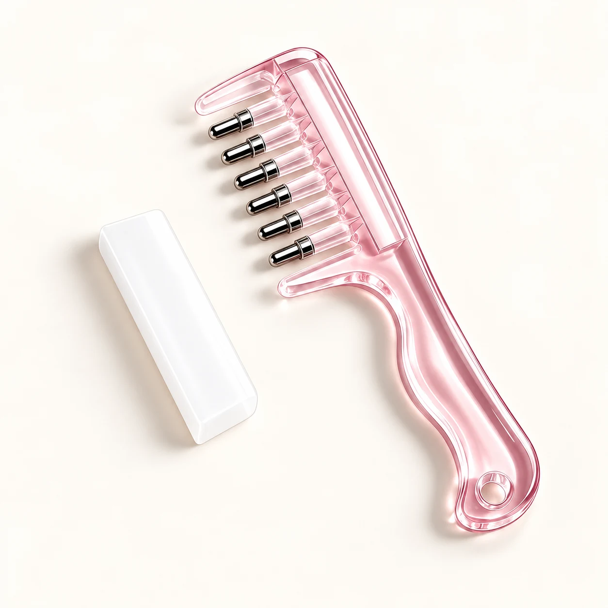 Pink scalp serum applicator comb with protective cap